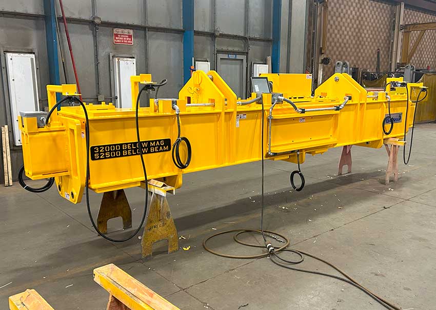 A Telescoping magnet beam manufactured by Bushman Equipment being tested before being shipped to their customer, a major Steel Manufacturer and Recycler in the United States